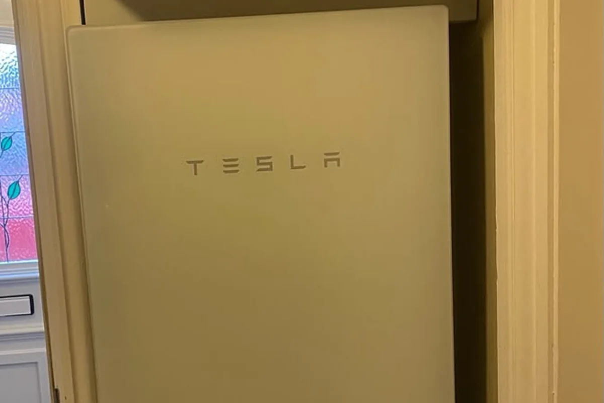 Tesla Powerwall fitted neatly in an alcove