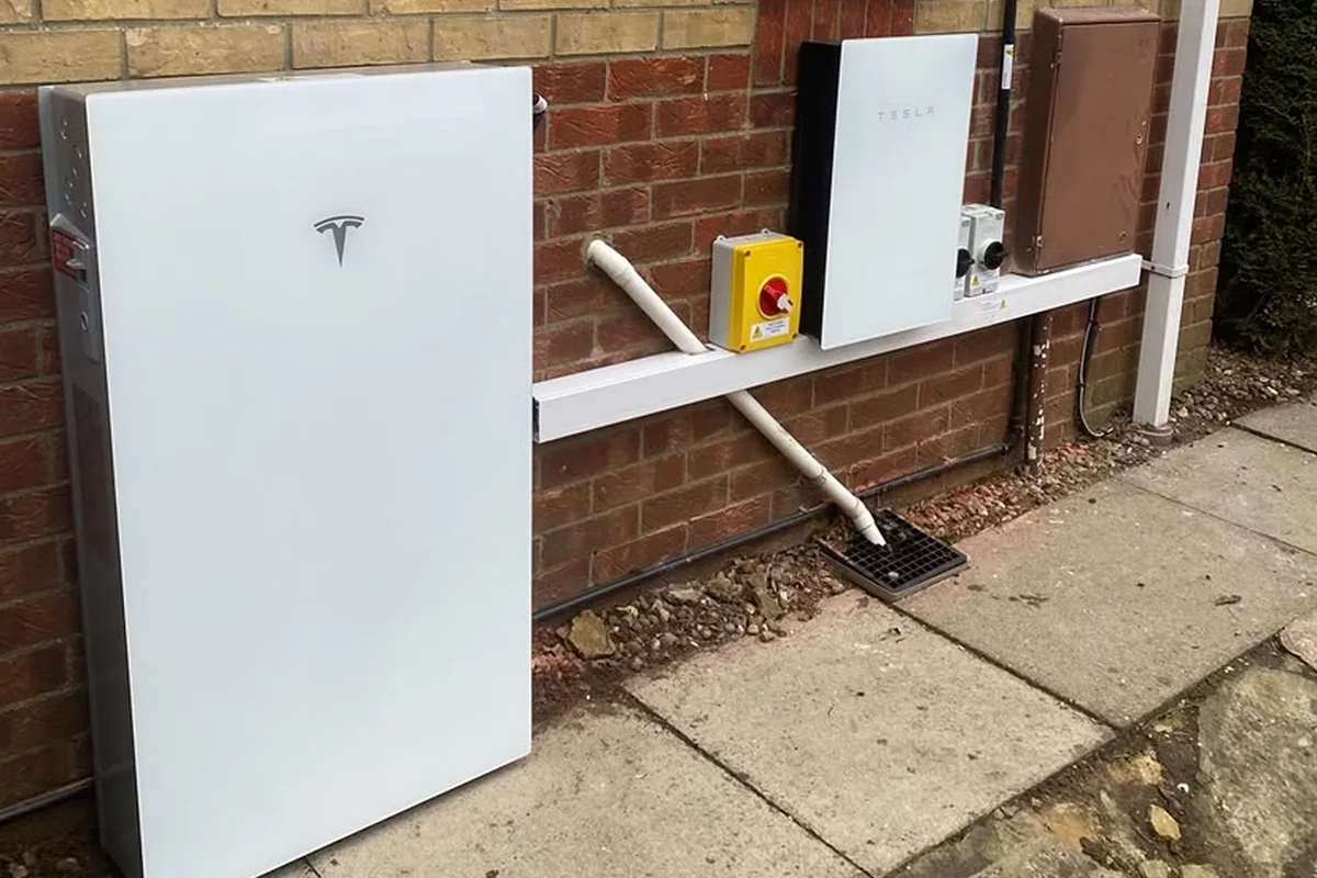 Tesla Powerwall and Backup Gateway wall-mounted outdoors