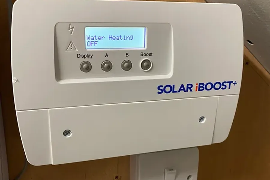 Marlec Solar iBoost+ solar diverter mounted on a wall