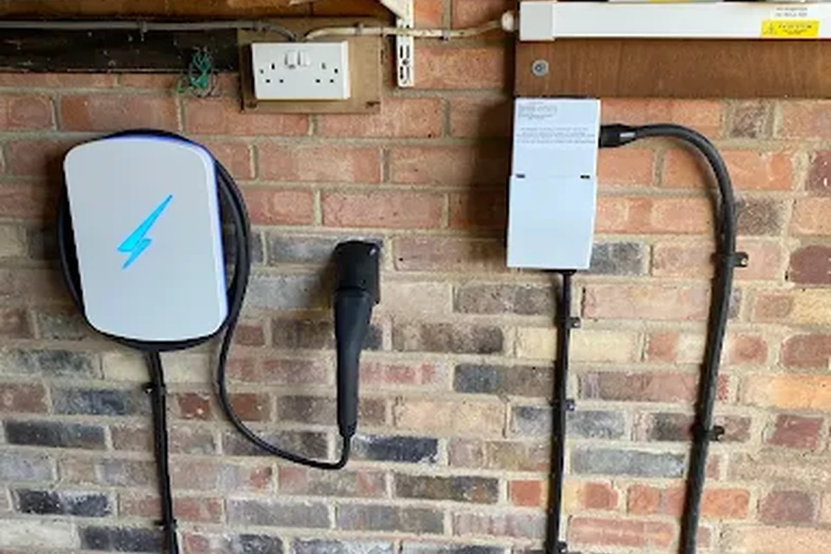 Hypervolt EV charger fitted in a garage with conduit to a sub-board