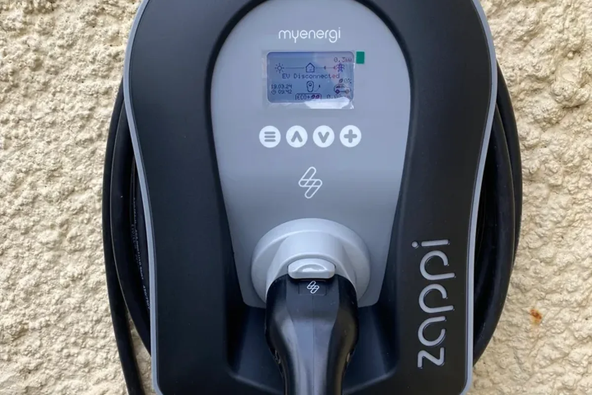 Zappi charger with the cable plugged in, screen showing status