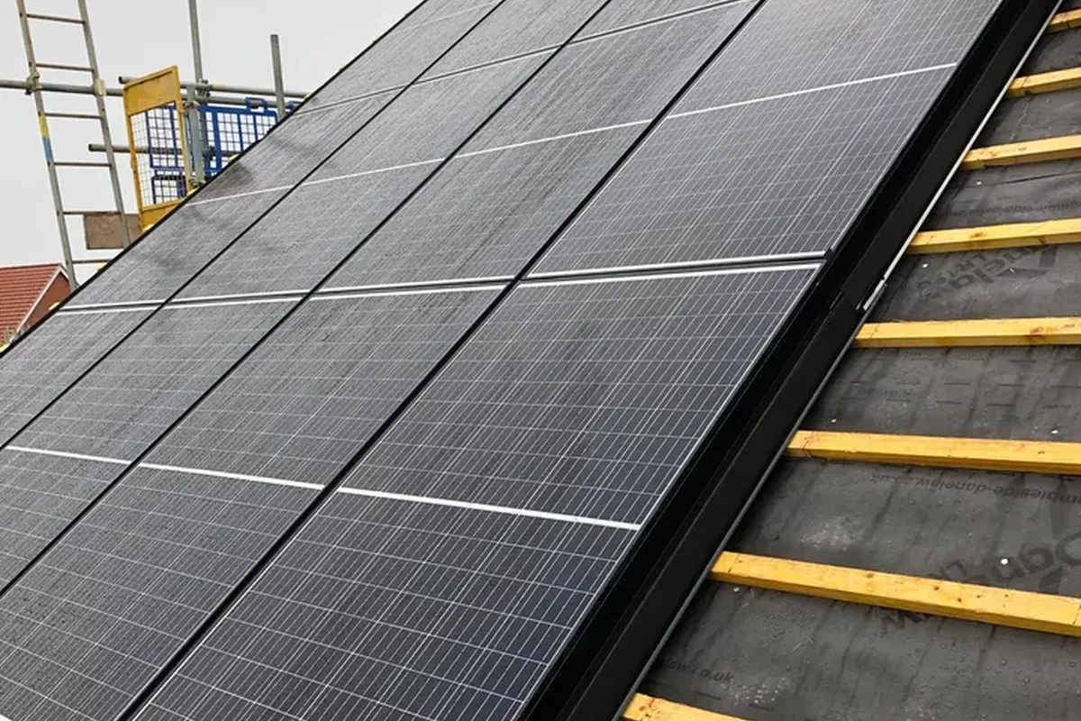Integrated panels set into the roof plane, battens exposed alongside