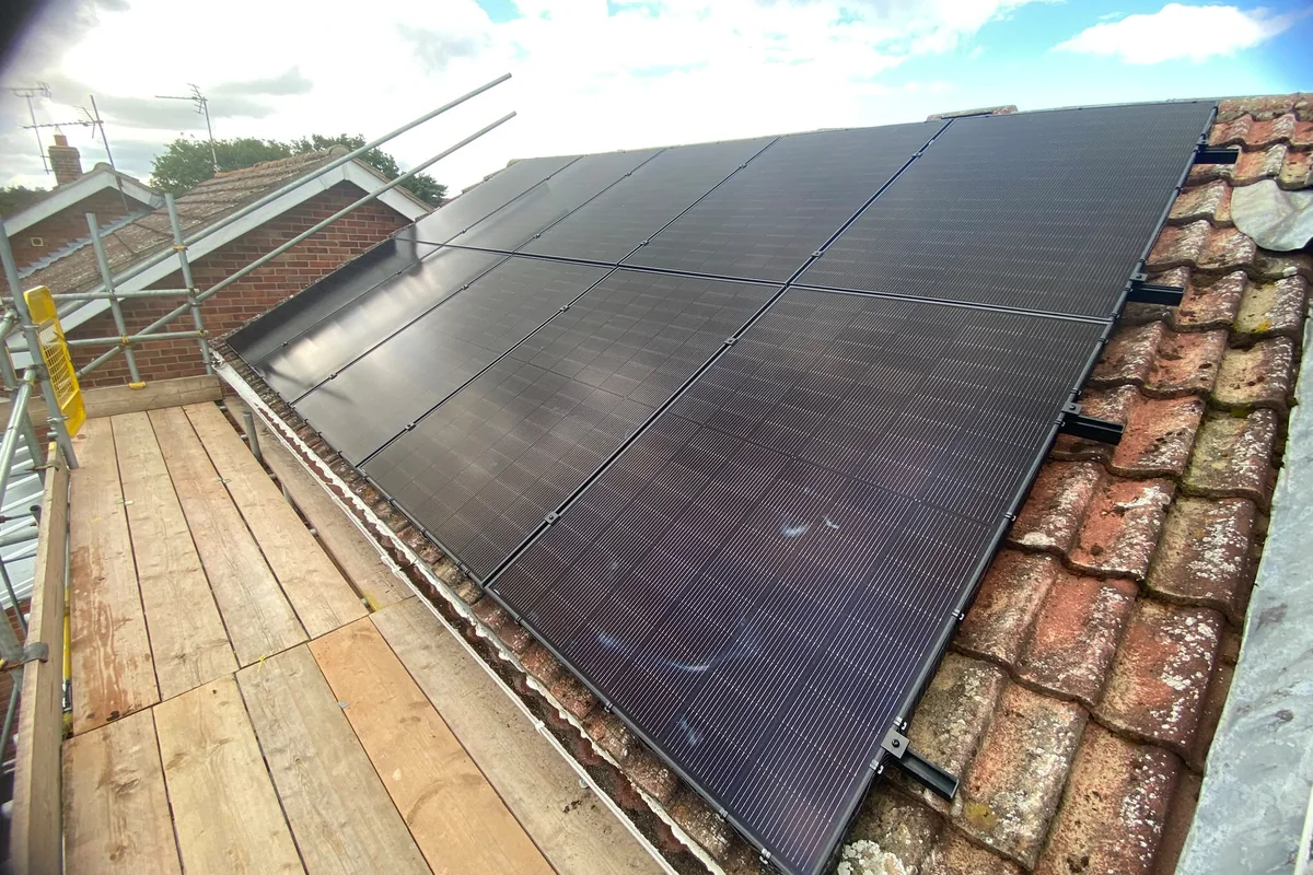 Completed all-black solar array on a pantile roof, Norfolk